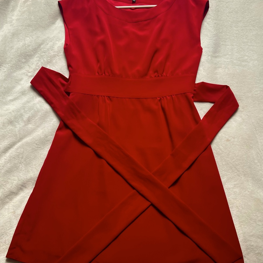 Red, sleeveless, knee length dress